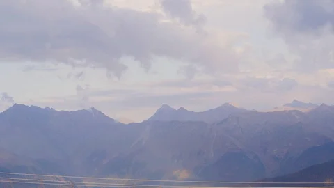 View of the mountain peaks and clouds above them. Caucasus Mountains Stock Footage 107031491