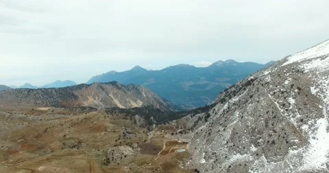 View From Mountain Peaks in a Cloudy Winter Day, 4k Drone Shot Stock Footage 171244041