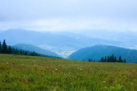 View of mountain peaks in spring time Stock Photos