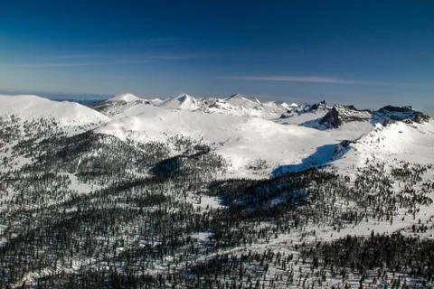 View of a mountain plain from a height. Stock Photos