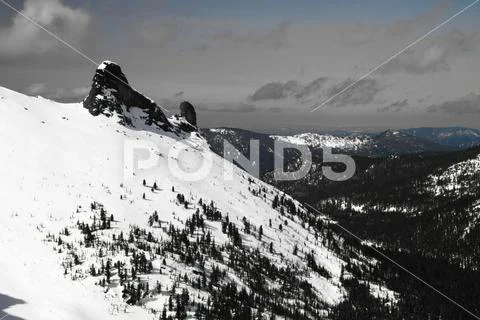 View of a mountain plain from a height. Stock Photos