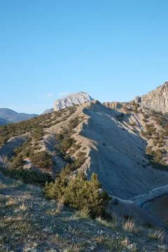 View of the mountain range from above, the mountain range divides the photo in Stock Photos