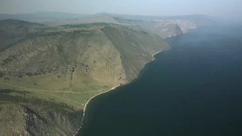 View of the mountain range from Lake Baikal, Siberia, Russia Stock Footage 169975203