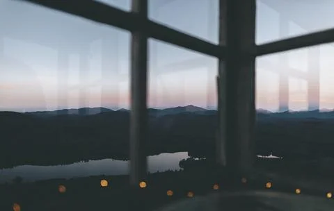View of mountain range outside the window Stock Photos
