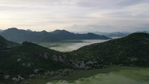 View of the mountain range from Skadar Lake, Montenegro Video stock 309385759