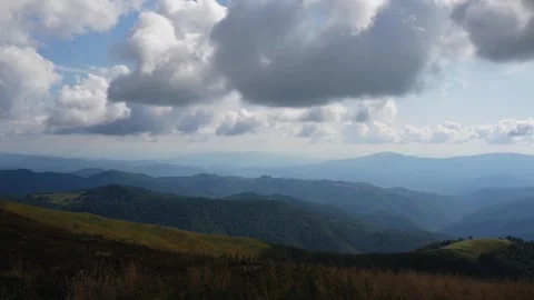 View Of Mountain Ranges In The Blue Mist And Cloudy Sky Stock Footage 171904541
