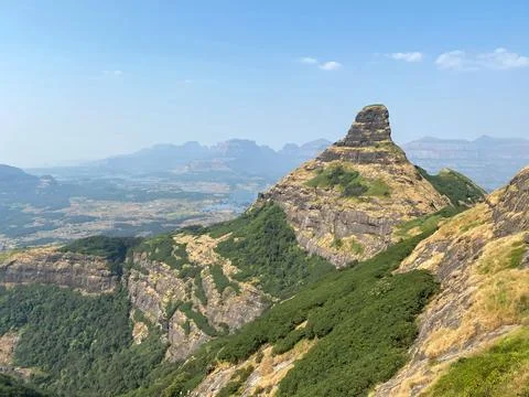 View of the mountain ranges while climbing up Ratangad Fort near Bhandardara  Stock Photos