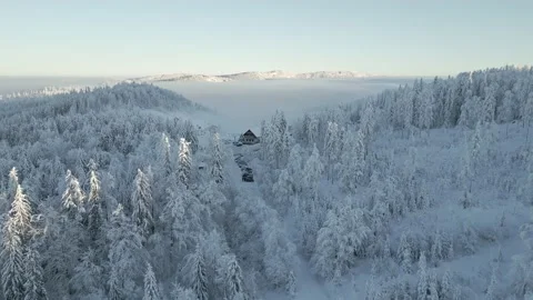 View of the mountain resort, ski slope, and people skiing in the mountains. Stock-Footage 238741637