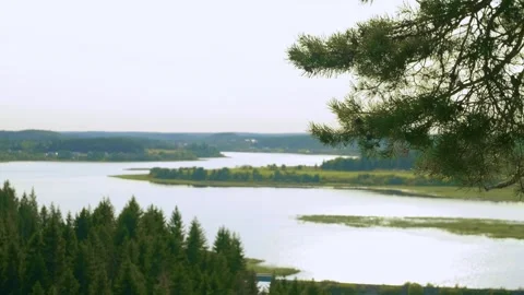 The view from a mountain to a river and forest. Enjoying the view. Stock-Footage 283534118