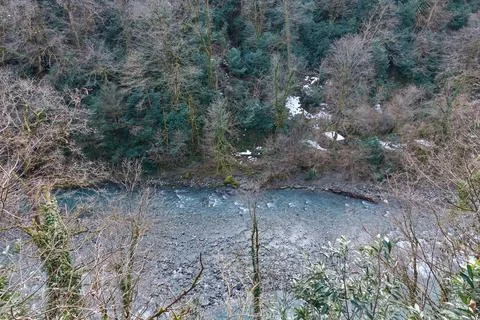 View of the mountain river from a drone. Winter forest, Stock Photos