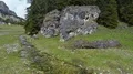 View of mountain rivulet flowing between huge stones, Dolomites, landscape 4k or 4k+ Resolution
