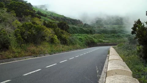 View of the mountain road in the clouds. Stock Footage 135417080
