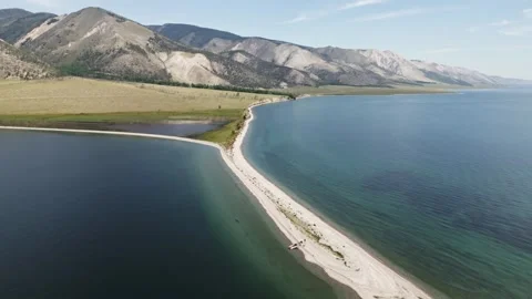 View of mountain rocks and blue clear water of the small sea of Lake Baikal Stock Footage 278442597