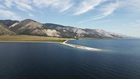 View of mountain rocks and blue clear water of the small sea of Lake Baikal Stock Footage 278442928