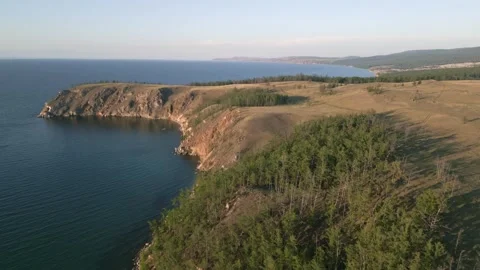 View of mountain rocks and blue clear water of the small sea of Lake Baikal Stock Footage 278443387