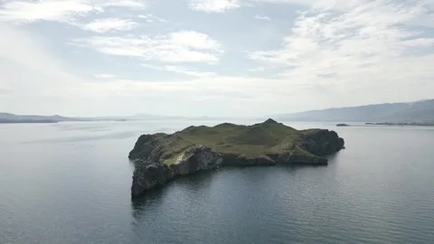 View of mountain rocks and blue clear water of the small sea of Lake Baikal Stock Footage 278443747