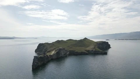 View of mountain rocks and blue clear water of the small sea of Lake Baikal Stock Footage 278443837