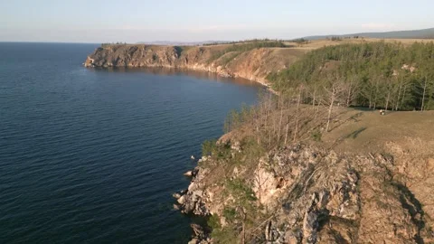 View of mountain rocks and blue clear water of the small sea of Lake Baikal Stock Footage 278443958