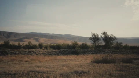 View of a mountain seen from the train Stock Footage 66494809
