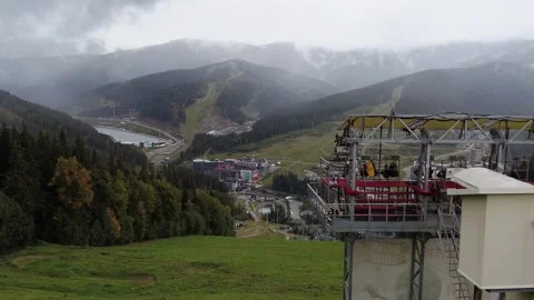 View from the mountain to the ski resort Bukovel and  Zip Line Attraction, Uk Stock-Footage 252275360