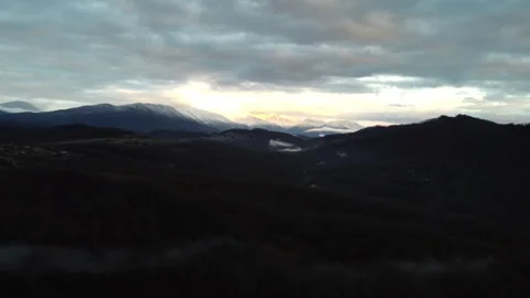 View of mountain sunset through autumn landscape Stock Footage 247088497