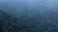 View from mountain top on dark foggy valley, cold night, misty landscape, nature HD Footage