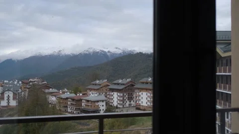 View of the mountain town from the window Stock Footage 145643327