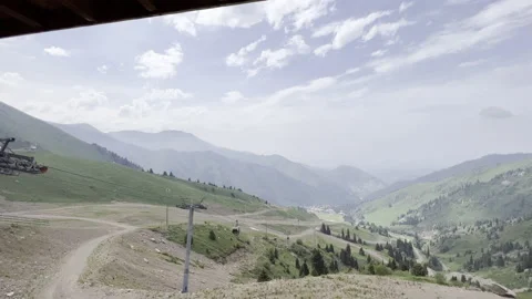 View of the mountain valley. Alpine ski resort in summer Stock Footage 200127801