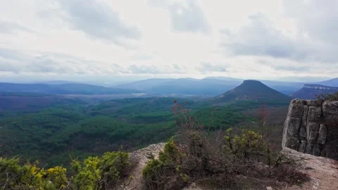 View from the mountain to the valley with the forest Stock Footage 261283087