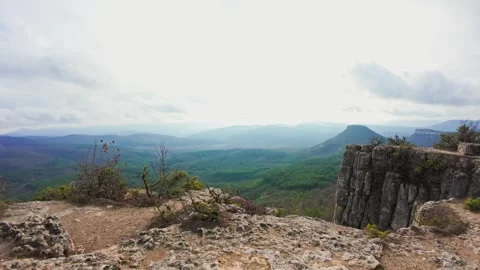 View from the mountain to the valley with the forest Stock Footage 261283640