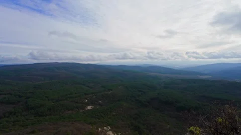 View from the mountain to the valley with the forest Stock Footage 261285193