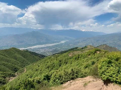 The view from the mountain to the valley Stock Photos