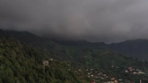 A view of a mountain village from a drone in cloudy weather Stock Footage 151262723