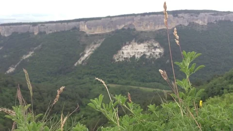 View of mountains and clouds and a grass at Mangup Kale - Crimea , Russia Stock Footage 73765952