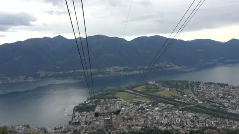 View of mountains and river from cable car ride in Cardada, Switzerland Stock Footage 132805101