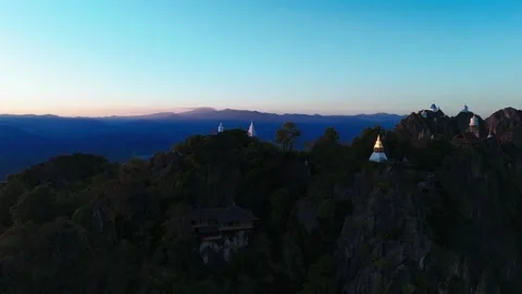 View of mountains and temple buildings in Lampang district, Thailand (2of2) Stock Footage 330869552
