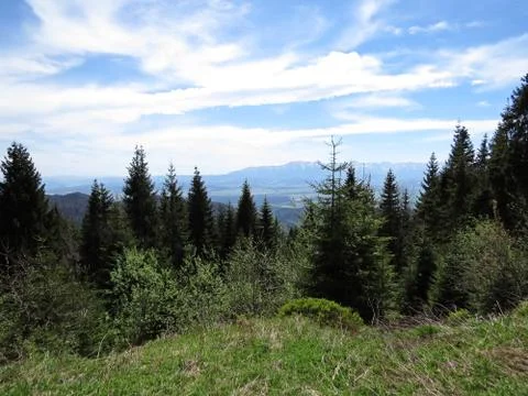 View at Mountains with Cloudy Sky Stock Photos