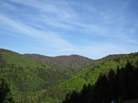 View at Mountains with Cloudy Sky Stock Photos
