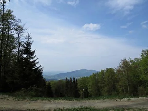View at Mountains with Cloudy Sky Stock Photos