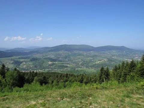 View at Mountains with Cloudy Sky Stock Photos