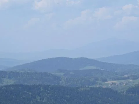 View at Mountains with Cloudy Sky Stock Photos