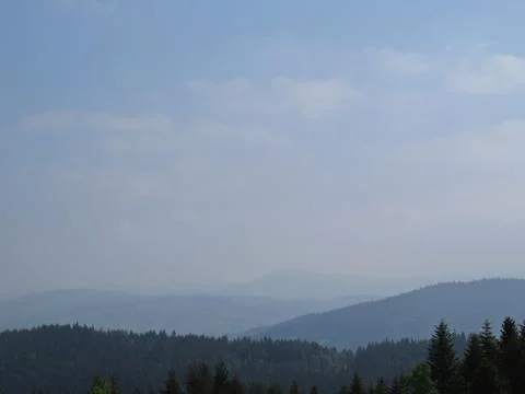View at Mountains with Cloudy Sky Stock Photos