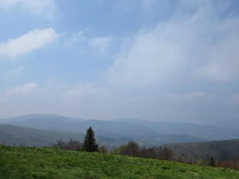 View at Mountains with Cloudy Sky Stock Photos
