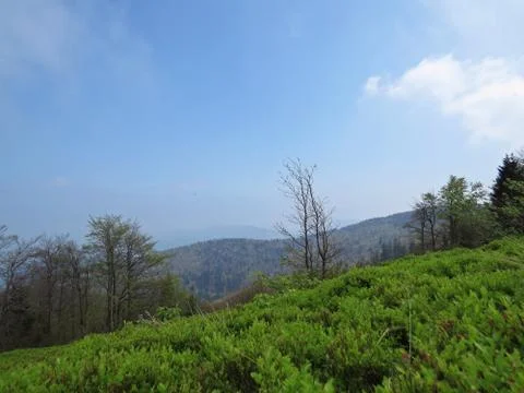 View at Mountains with Cloudy Sky Stock Photos
