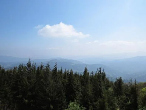 View at Mountains with Cloudy Sky Stock Photos