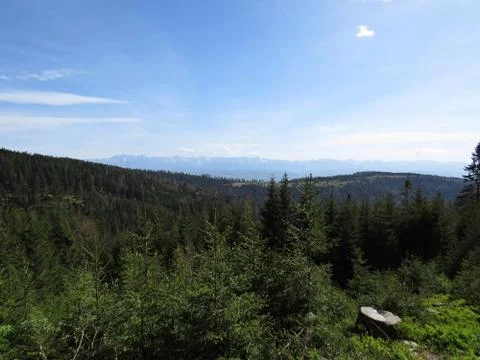 View at Mountains with Cloudy Sky Stock Photos