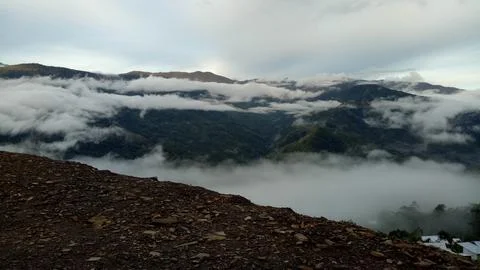 View of mountains covered with clouds in the evening 库存照片