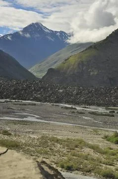 View of mountains covered with clouds from the peak with Bhaga river in Darcha Stock Photos