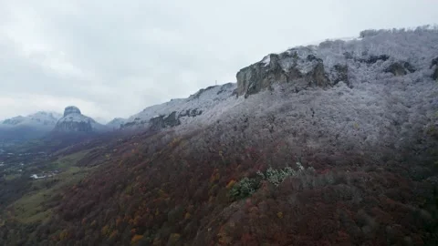 View of the mountains covered with the first snow from a bird's-eye view Stock Footage 170730847