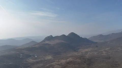 View of the mountains in the distance in the haze Stock-Footage 268603219